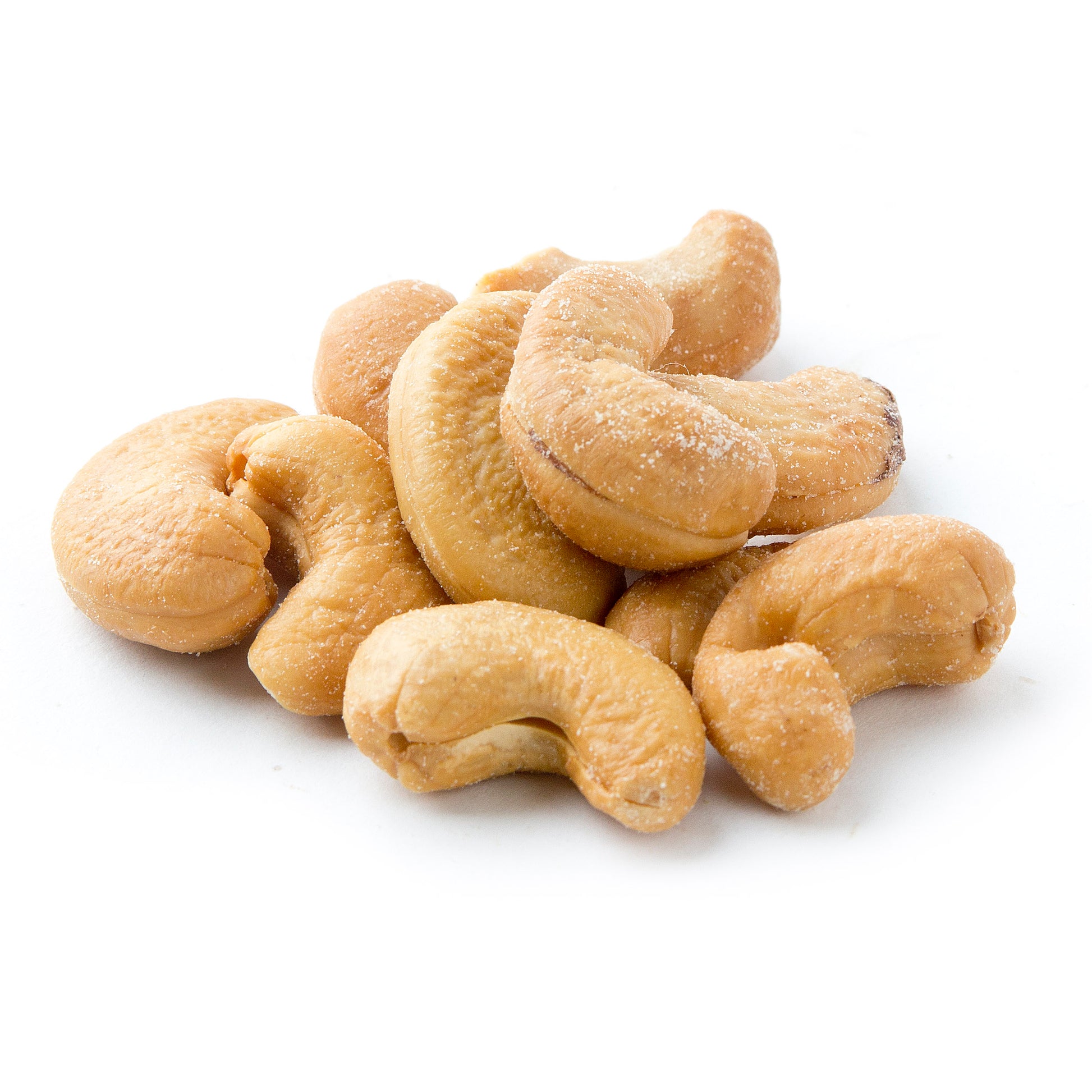 A pile of roasted salted cashew nuts on a white background.